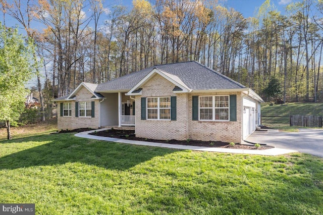 6815 Interlude Pl, Hughesville, MD 20637 - single story home with brick siding, fence, driveway, a front lawn, and an attached garage