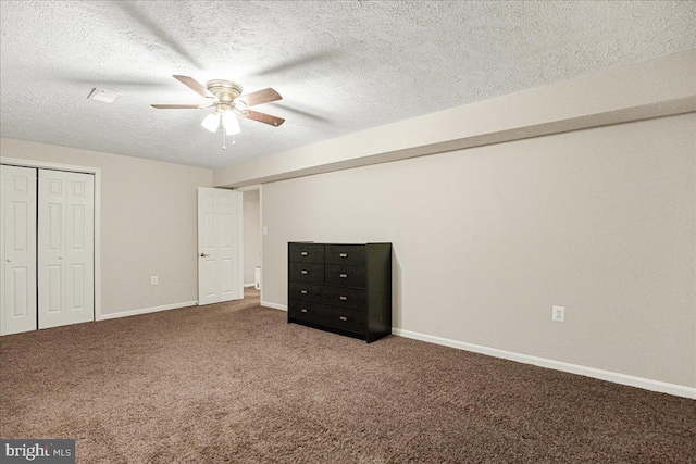 6815 Interlude Pl, Hughesville, MD 20637 - unfurnished bedroom with a closet, ceiling fan, baseboards, a textured ceiling, and carpet floors