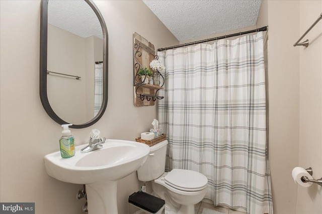 6815 Interlude Pl, Hughesville, MD 20637 - bathroom with a textured ceiling, toilet, and a shower with shower curtain