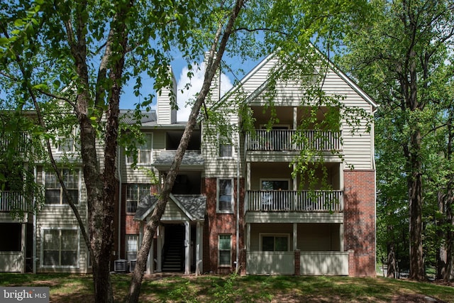 12152 Penderview Ter Unit 1322, Fairfax, VA 22033 - view of building exterior featuring central AC