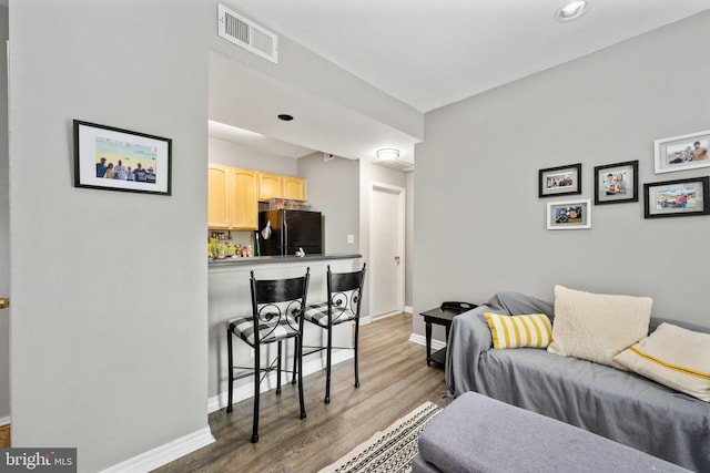 12152 Penderview Ter Unit 1322, Fairfax, VA 22033 - living room featuring visible vents, recessed lighting, light wood-style flooring, and baseboards