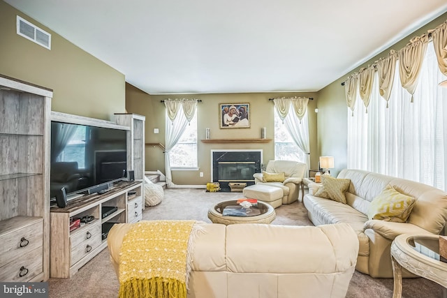 2 Rosebush Ct, Sicklerville, NJ 08081 - carpeted living area with a glass covered fireplace and baseboards