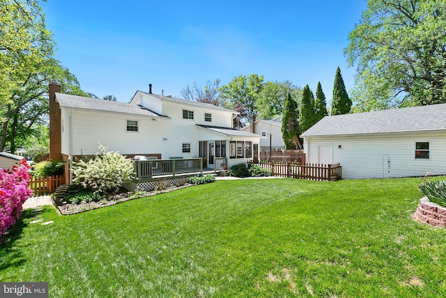 5311 Crestedge Ln, Rockville, MD 20853 - rear view of house with a sunroom, a chimney, and a deck