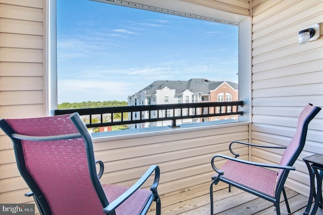 balcony featuring a residential view