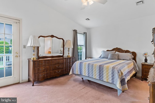 bedroom with carpet floors, visible vents, and access to exterior