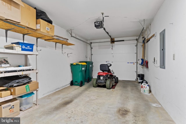 garage featuring a garage door opener and electric panel