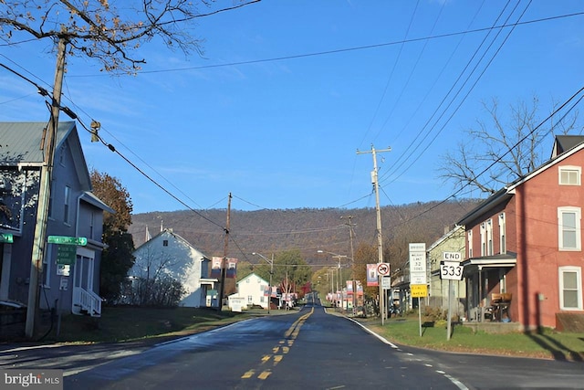 9635 Upper Strasburg Rd, Upperstrasburg, PA 17265 - view of road featuring a residential view, traffic signs, and street lighting