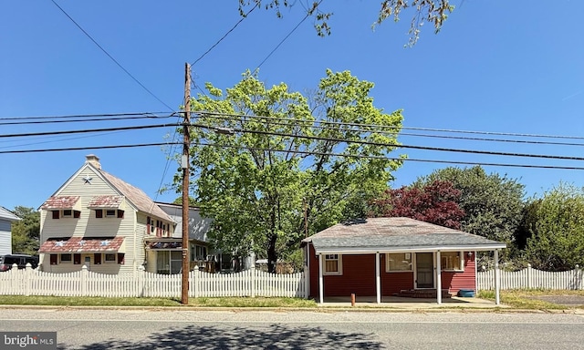 377 Main St, Cedarville, NJ 08311 - view of building exterior featuring a fenced front yard