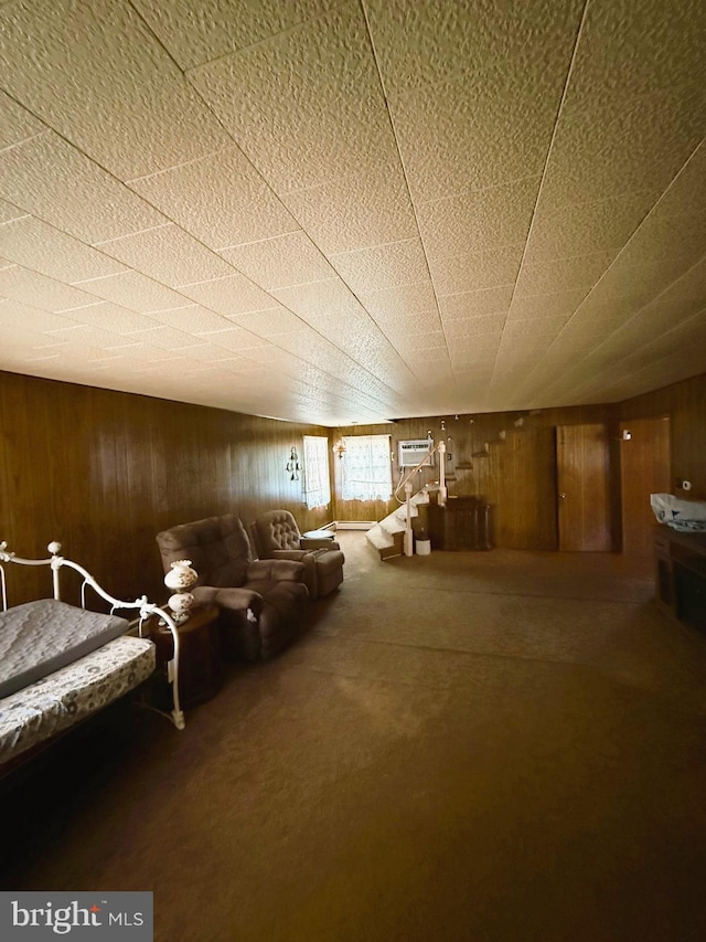 377 Main St, Cedarville, NJ 08311 - interior space featuring an AC wall unit, carpet flooring, and wood walls