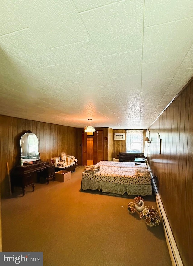377 Main St, Cedarville, NJ 08311 - carpeted bedroom with baseboard heating and wood walls