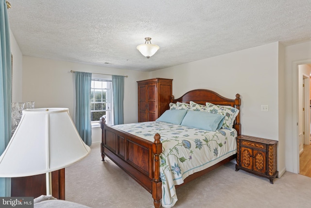 bedroom with a textured ceiling