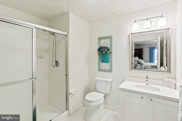 full bathroom featuring toilet, a stall shower, a textured ceiling, and ensuite bath