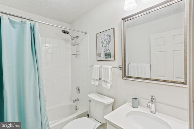 bathroom with shower / tub combo, a textured ceiling, toilet, and vanity