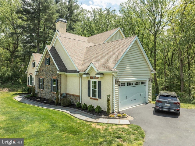 view of front of home with a garage, aphalt driveway, stone siding, roof with shingles, and a chimney