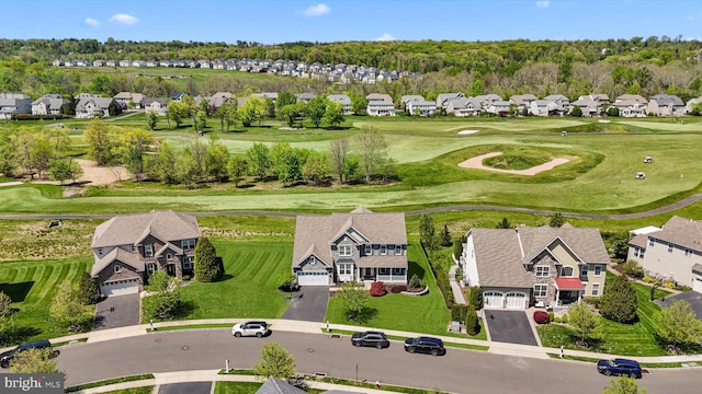 bird's eye view featuring view of golf course and a residential view
