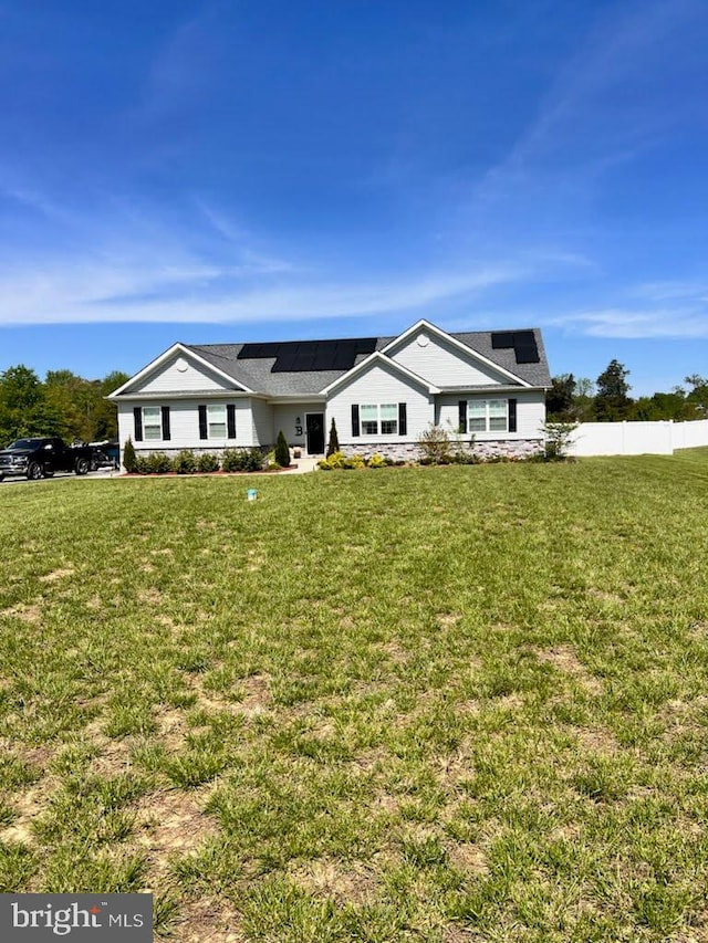9937 Sodus Ct, Faulkner, MD 20632 - view of front of property with fence, solar panels, and a front lawn