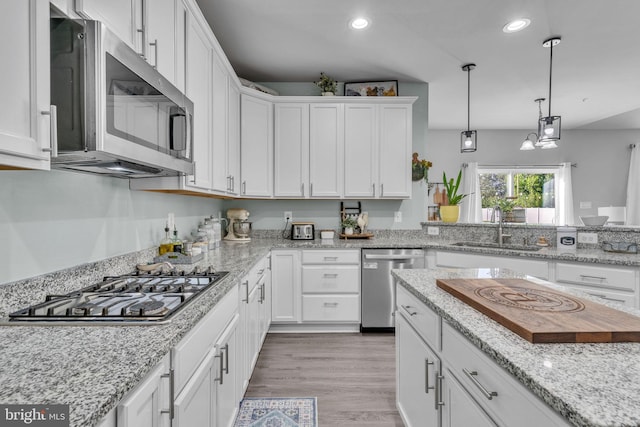 9937 Sodus Ct, Faulkner, MD 20632 - kitchen with recessed lighting, white cabinetry, stainless steel appliances, and a sink