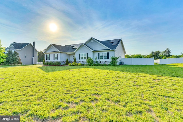 9937 Sodus Ct, Faulkner, MD 20632 - single story home featuring central air condition unit, solar panels, a front lawn, and fence