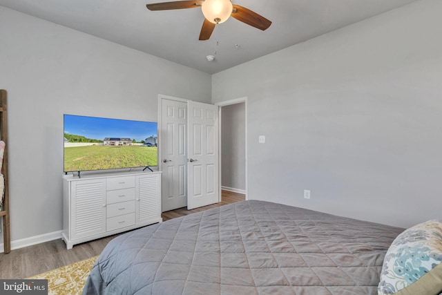 9937 Sodus Ct, Faulkner, MD 20632 - bedroom with baseboards, wood finished floors, and a ceiling fan