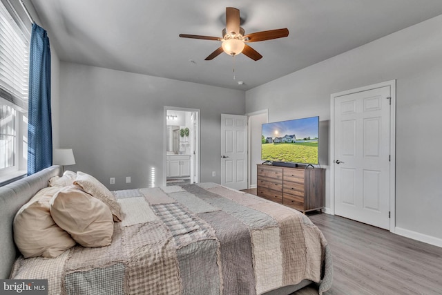 9937 Sodus Ct, Faulkner, MD 20632 - bedroom featuring ensuite bathroom, wood finished floors, baseboards, and ceiling fan