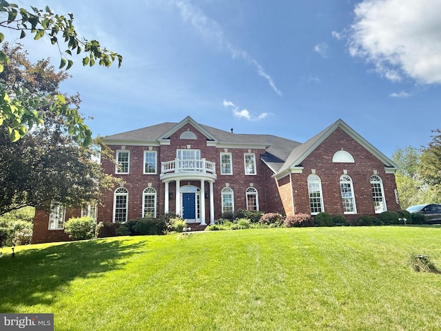 14309 Cervantes Ave, Darnestown, MD 20874 - colonial home featuring brick siding, a balcony, and a front lawn