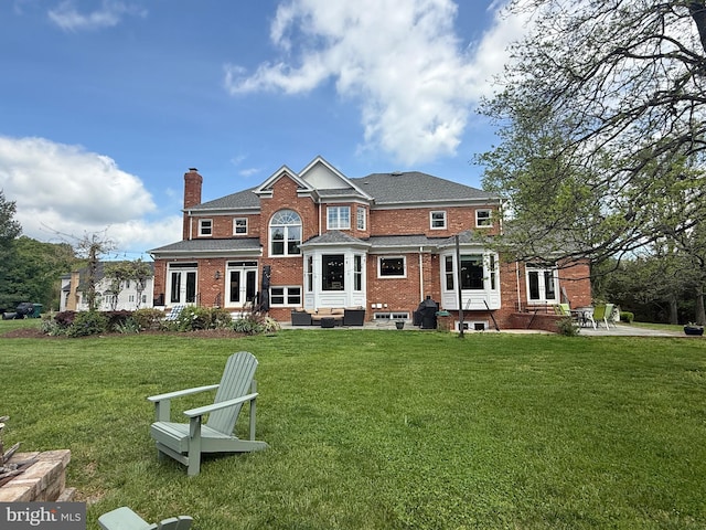 14309 Cervantes Ave, Darnestown, MD 20874 - back of house with an outdoor living space, french doors, a chimney, a lawn, and brick siding