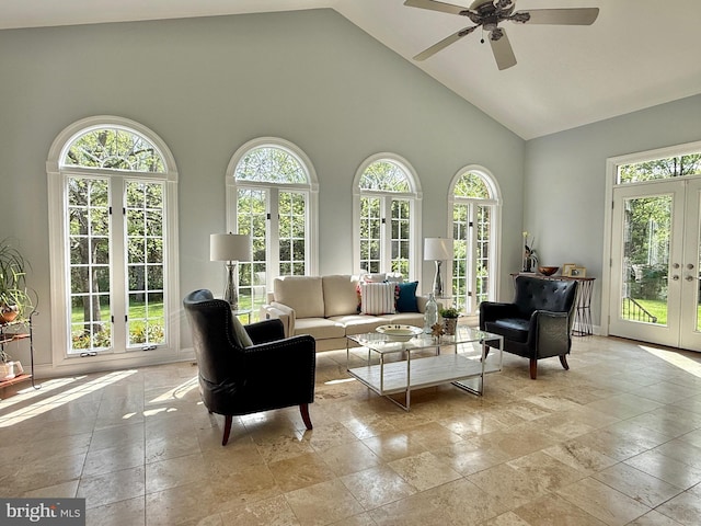 14309 Cervantes Ave, Darnestown, MD 20874 - living area featuring high vaulted ceiling, ceiling fan, french doors, and stone tile floors