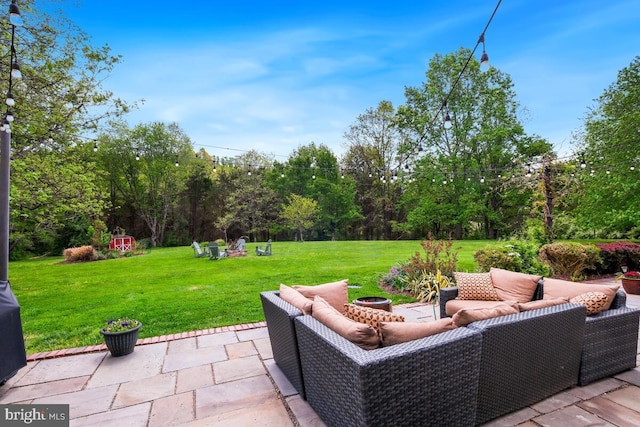 14309 Cervantes Ave, Darnestown, MD 20874 - view of patio / terrace with an outdoor living space with a fire pit