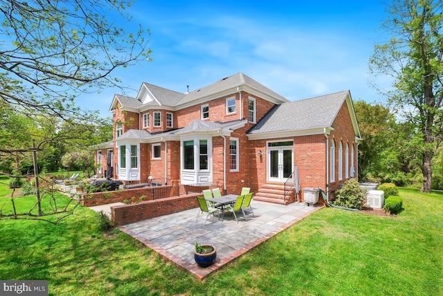 14309 Cervantes Ave, Darnestown, MD 20874 - back of property featuring brick siding, entry steps, french doors, a patio, and a yard