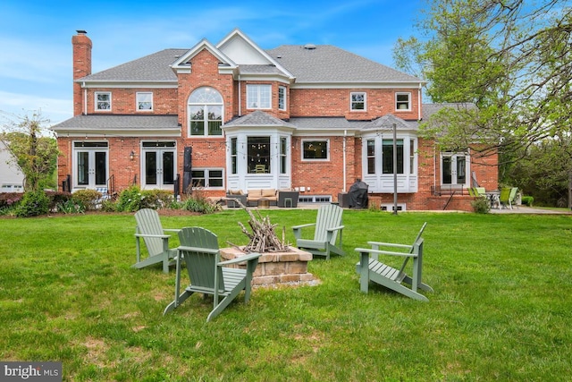 14309 Cervantes Ave, Darnestown, MD 20874 - back of house with a lawn, a patio area, french doors, and a chimney