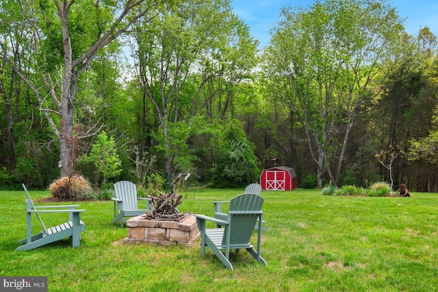 14309 Cervantes Ave, Darnestown, MD 20874 - view of yard with an outdoor structure, an outdoor fire pit, and a shed
