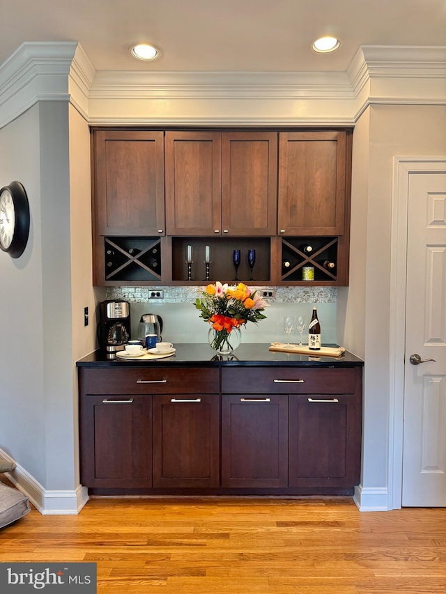 14309 Cervantes Ave, Darnestown, MD 20874 - bar featuring baseboards, a dry bar, ornamental molding, and light wood finished floors