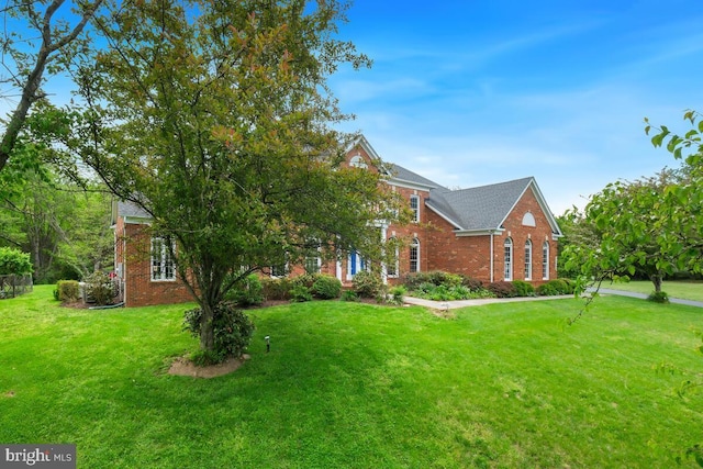 14309 Cervantes Ave, Darnestown, MD 20874 - obstructed view of property featuring brick siding and a front yard
