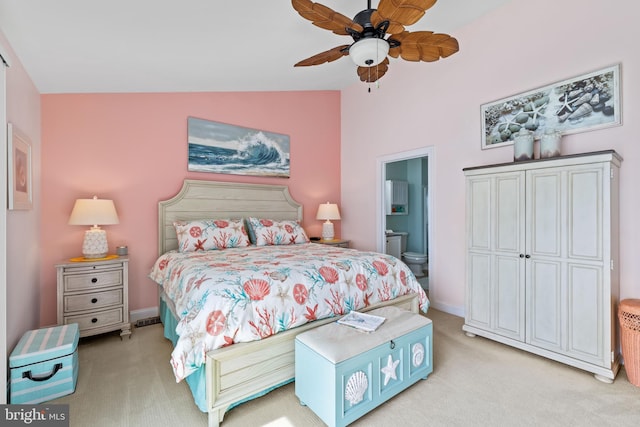17598 Paleo Way Unit 9, Millsboro, DE 19966 - bedroom with light colored carpet, lofted ceiling, ensuite bathroom, ceiling fan, and baseboards