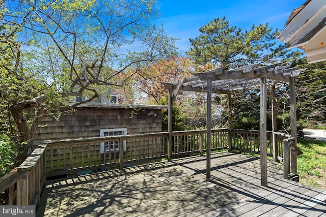 wooden terrace featuring a pergola