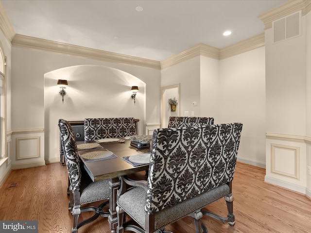 6 Jarretts Ct, Reisterstown, MD 21136 - dining space with arched walkways, ornamental molding, wood finished floors, and recessed lighting
