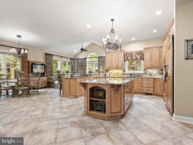 6 Jarretts Ct, Reisterstown, MD 21136 - kitchen with a chandelier, tasteful backsplash, open shelves, light stone counters, and a peninsula