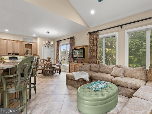 6 Jarretts Ct, Reisterstown, MD 21136 - living room featuring a chandelier, plenty of natural light, recessed lighting, light tile patterned floors, and vaulted ceiling