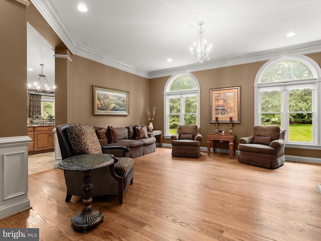 6 Jarretts Ct, Reisterstown, MD 21136 - living room featuring a chandelier, crown molding, light wood-type flooring, and recessed lighting