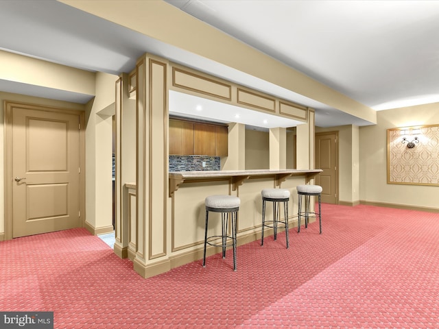 6 Jarretts Ct, Reisterstown, MD 21136 - kitchen featuring carpet flooring, a breakfast bar area, tasteful backsplash, light countertops, and recessed lighting