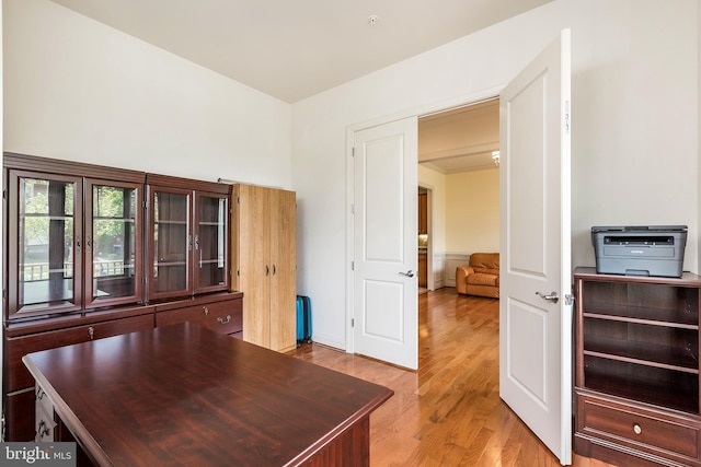 home office with light wood-type flooring