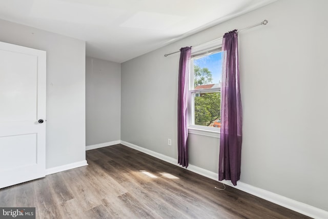 2026 S Oakland St S, Arlington, VA 22204 - unfurnished room featuring wood finished floors and baseboards