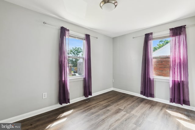 2026 S Oakland St S, Arlington, VA 22204 - unfurnished room with baseboards and wood finished floors