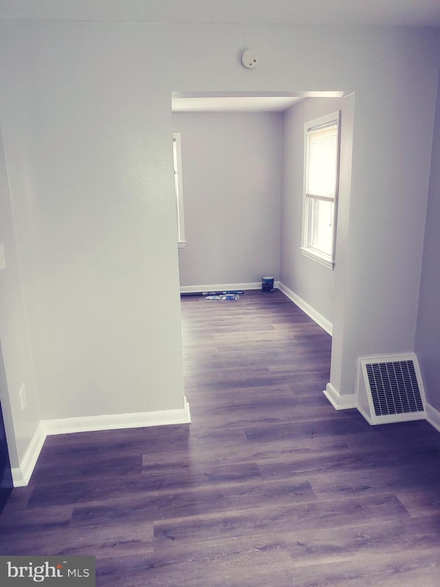 2026 S Oakland St S, Arlington, VA 22204 - spare room with baseboards, visible vents, and wood finished floors