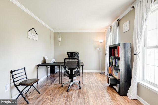 home office with baseboards, ornamental molding, and wood finished floors