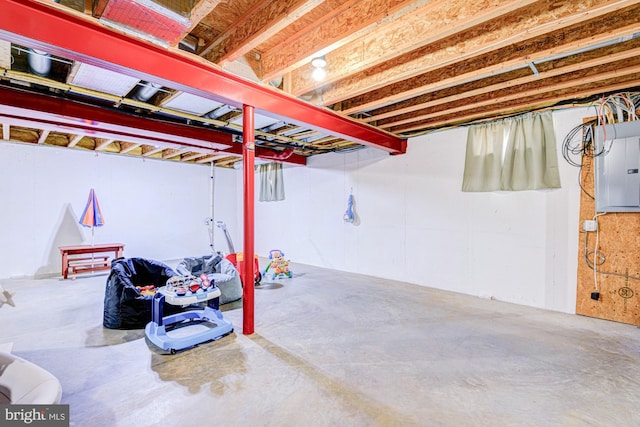 unfinished below grade area with electric panel