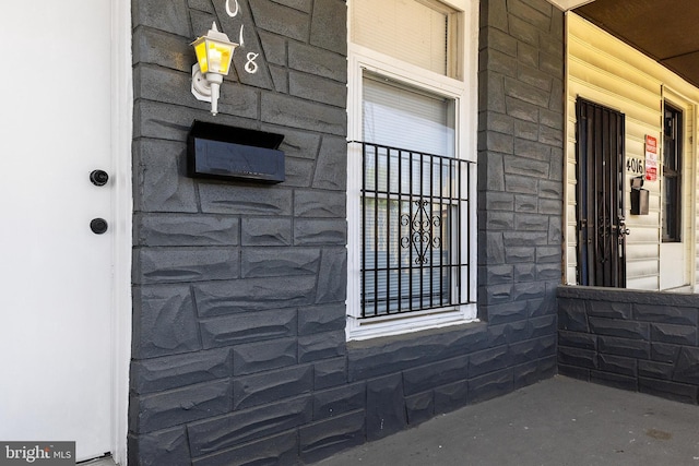 4018 Pennington Ave, Baltimore City, MD 21226 - exterior space with covered porch and stone siding