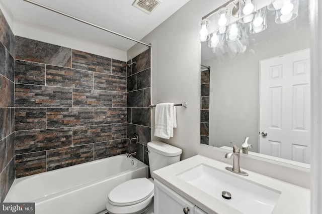 bathroom with visible vents, bathtub / shower combination, toilet, and vanity