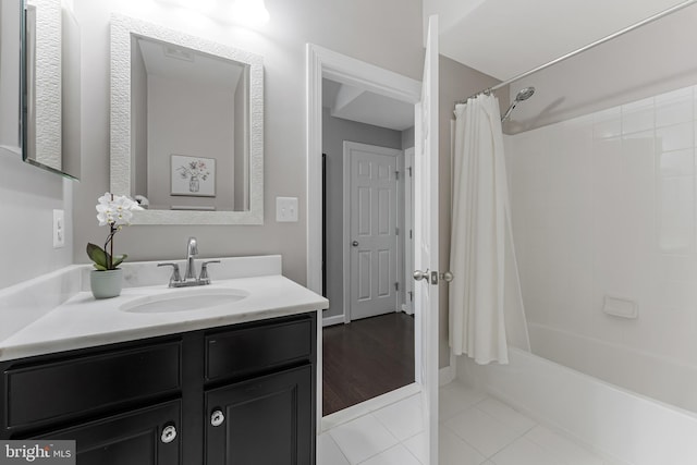 1524 Kinnaird Ter NE, Leesburg, VA 20176 - full bathroom featuring tile patterned floors, vanity, and shower / tub combo