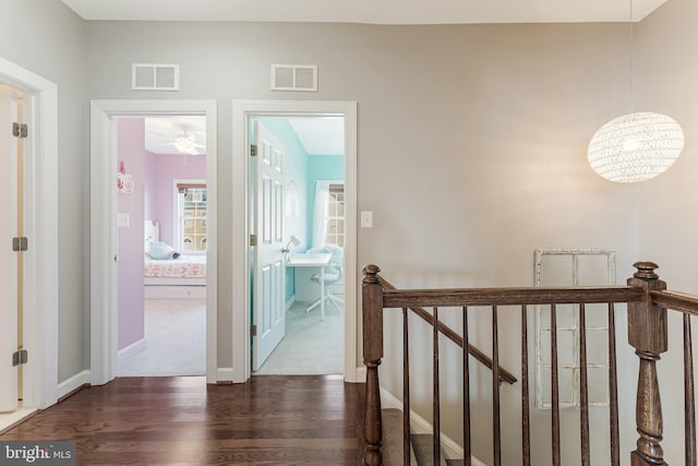 1524 Kinnaird Ter NE, Leesburg, VA 20176 - corridor featuring baseboards, an upstairs landing, dark wood-style floors, and visible vents
